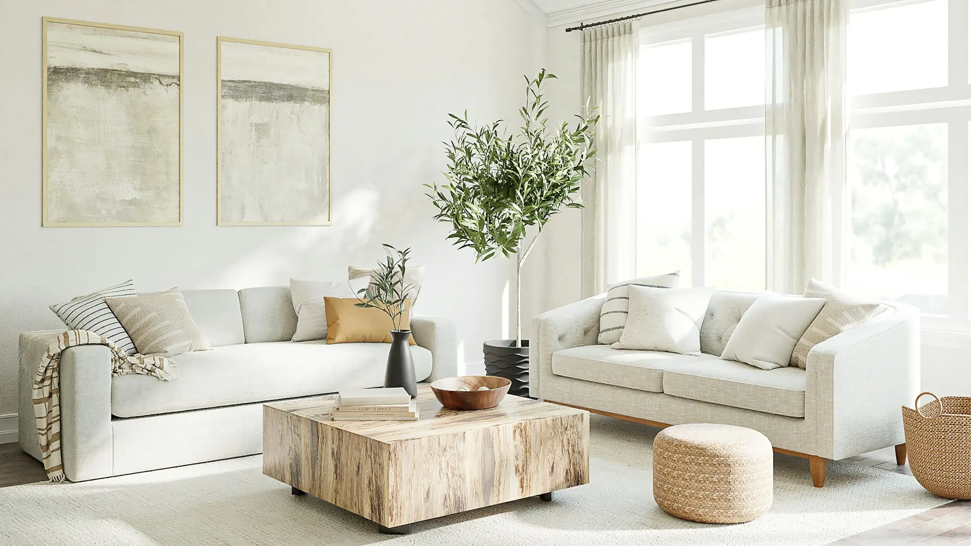 An airy living room with two sofas and a large window with sheer curtains